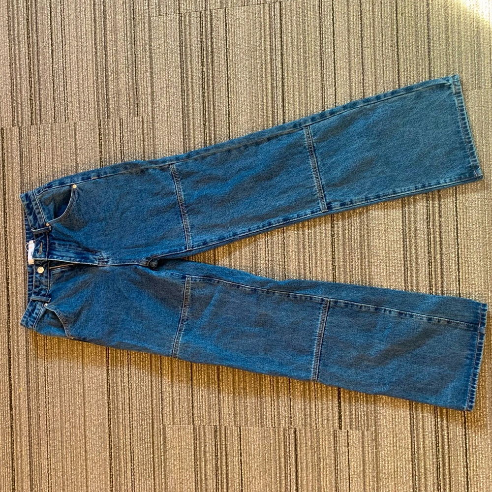 Brand new, never worn Adika long flared jeans!
